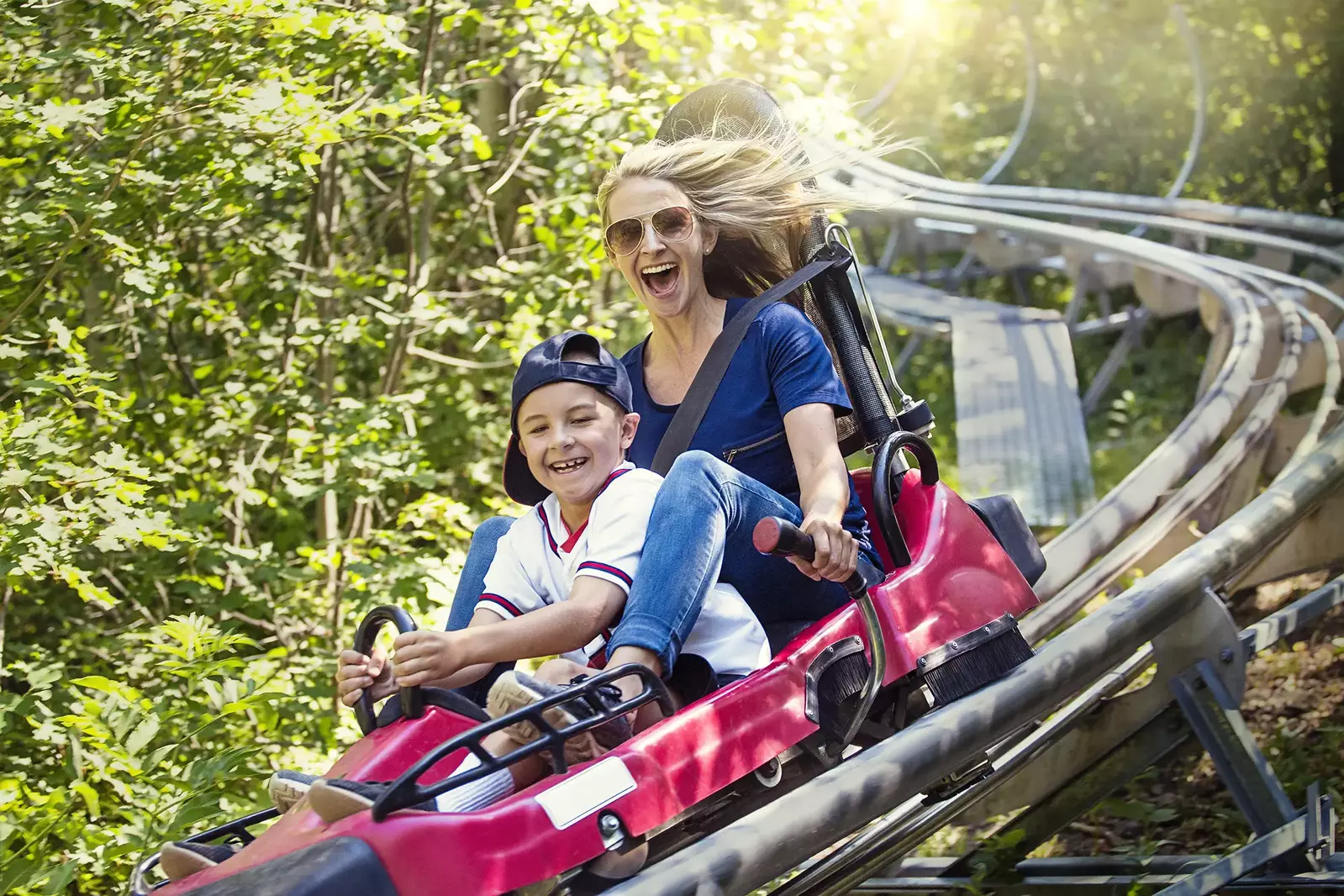parent and child on mountain coaster